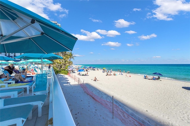 view of water feature with a beach view