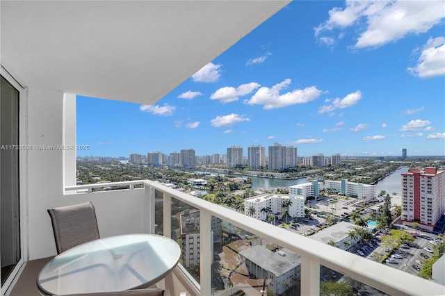 balcony featuring a water view