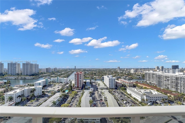 property's view of city with a water view