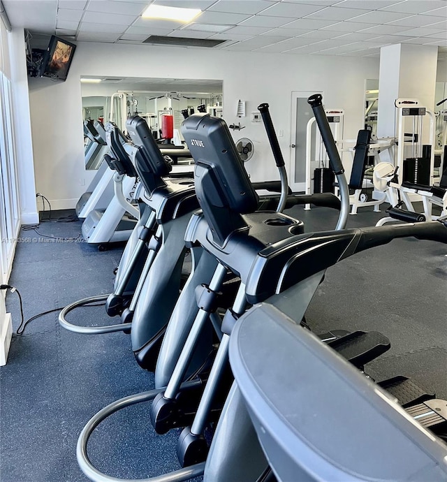 gym with a drop ceiling