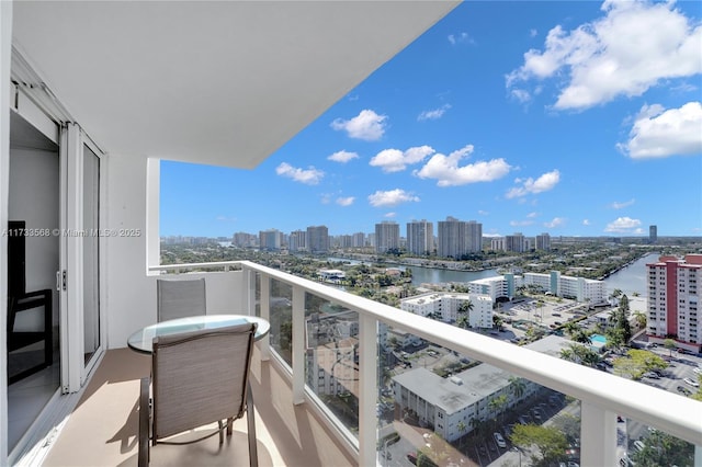 balcony featuring a water view