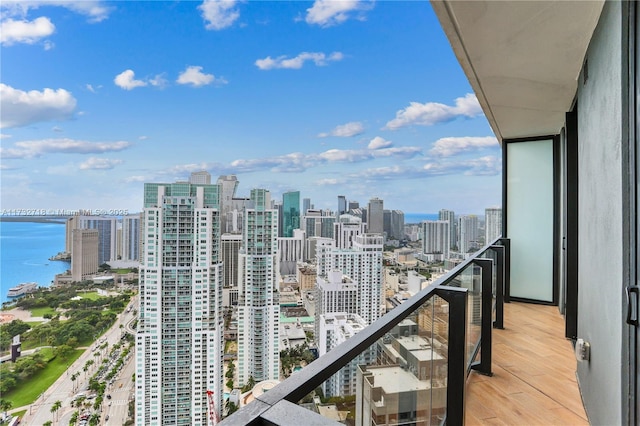 balcony featuring a water view