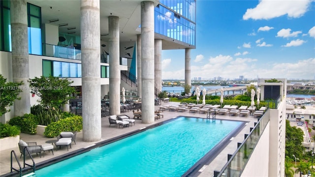 view of pool featuring a patio