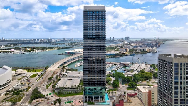 birds eye view of property featuring a water view