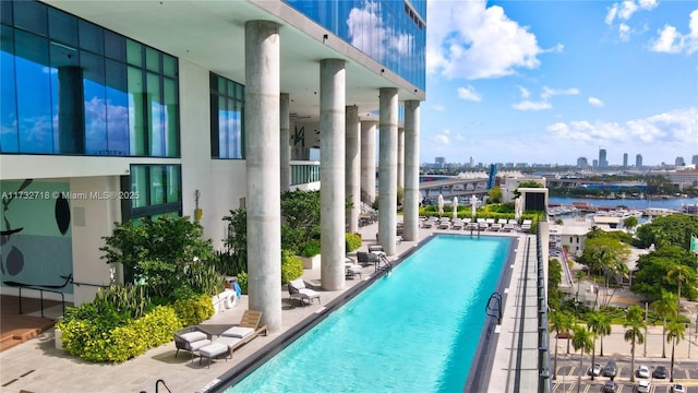 view of pool featuring a patio