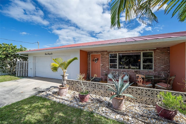 ranch-style house featuring a garage