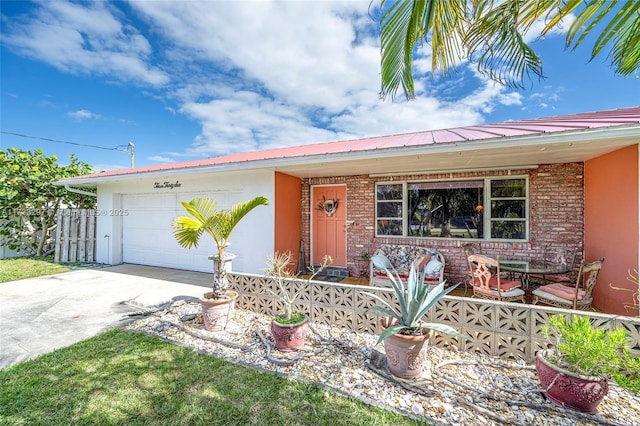 ranch-style home with a garage