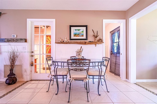 view of tiled dining space