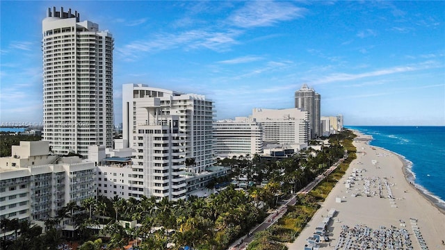 city view featuring a water view and a view of the beach