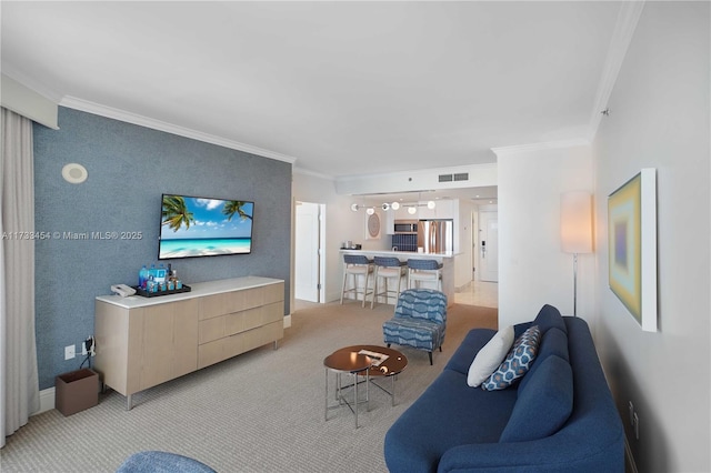 carpeted living room featuring ornamental molding