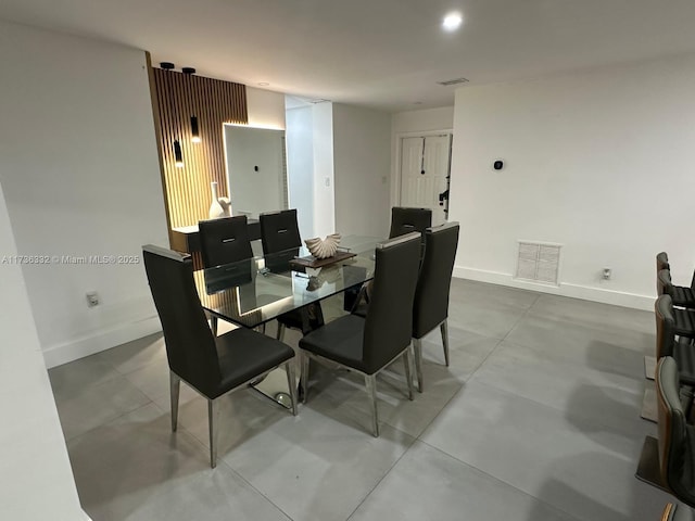 dining room featuring concrete floors