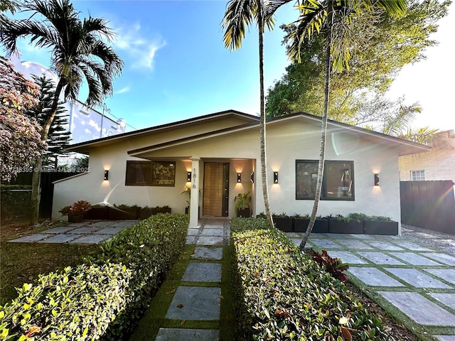 1816 SW 11th Ter, Miami, FL 33135 - view of front of home with stucco siding and a patio