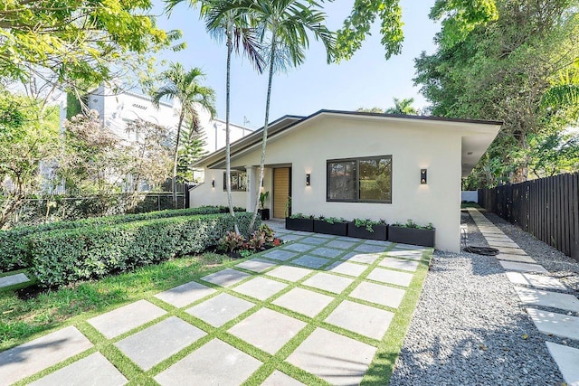 1816 SW 11th Ter, Miami, FL 33135 - view of front of house featuring stucco siding and a patio