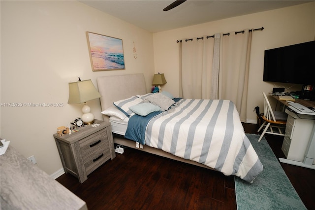 bedroom featuring dark hardwood / wood-style floors