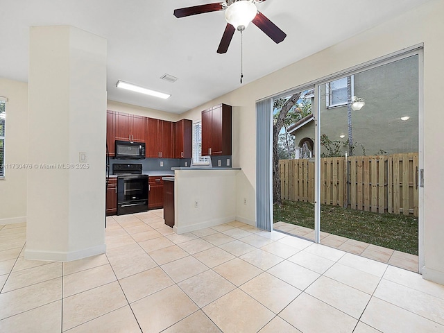 kitchen featuring black appliances, ceiling fan, and light tile patterned flooring