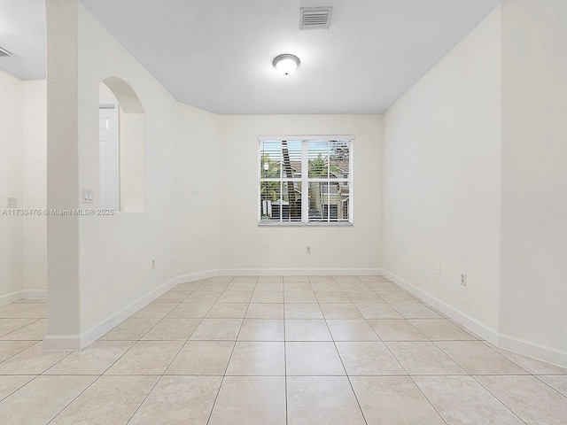 view of tiled empty room