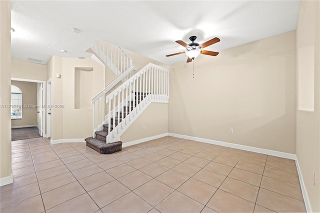 spare room with ceiling fan