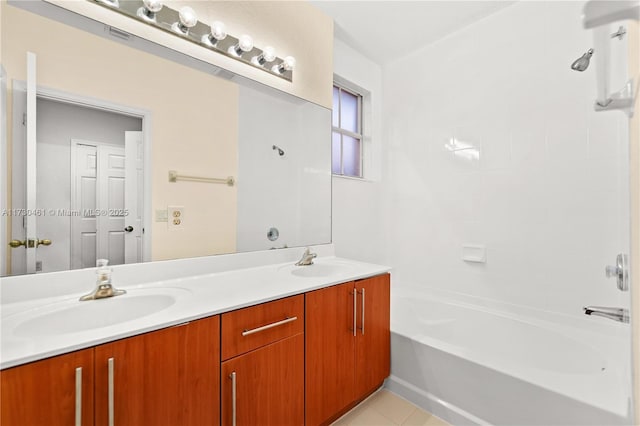 bathroom with vanity and tile patterned floors