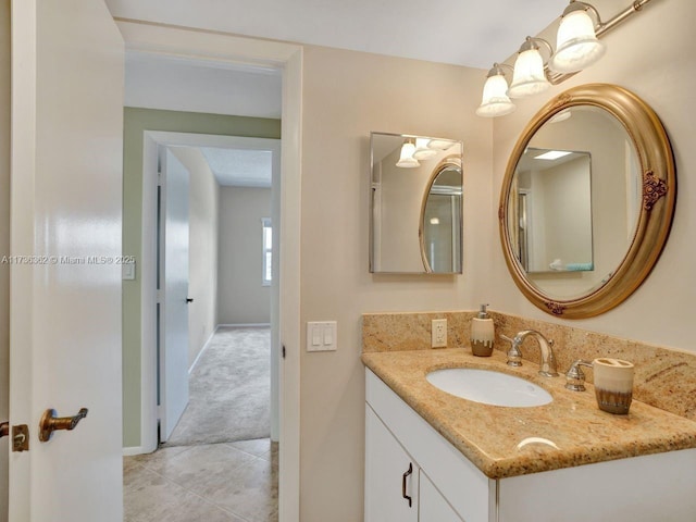 bathroom with vanity and tile patterned flooring