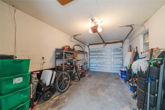 garage featuring a garage door opener