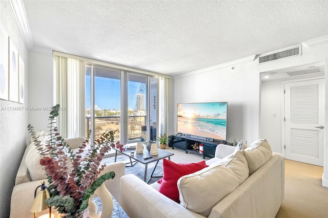 living room featuring expansive windows, crown molding, light carpet, and a textured ceiling