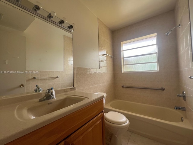 full bathroom with tiled shower / bath combo, vanity, tile walls, and toilet