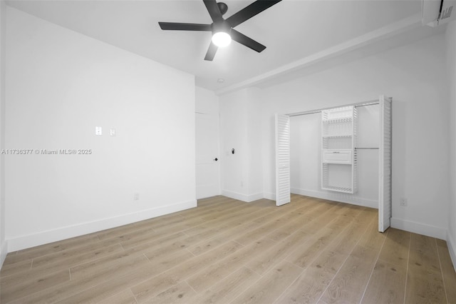 unfurnished bedroom featuring ceiling fan and light wood-type flooring