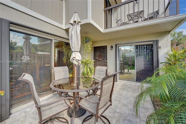 view of patio / terrace with a balcony