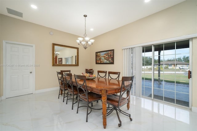 dining area with a notable chandelier