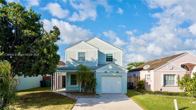 front of property with a garage and a front lawn