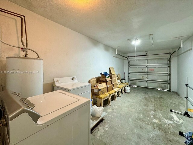 garage featuring washer / dryer and water heater