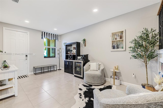 living area with light tile patterned floors