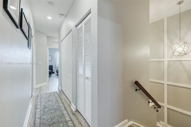 hallway featuring hardwood / wood-style floors