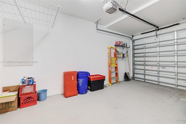 garage featuring a garage door opener