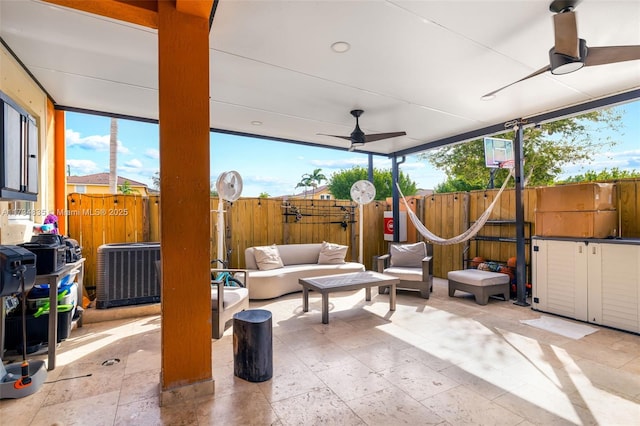 view of patio with ceiling fan, an outdoor hangout area, and central AC unit