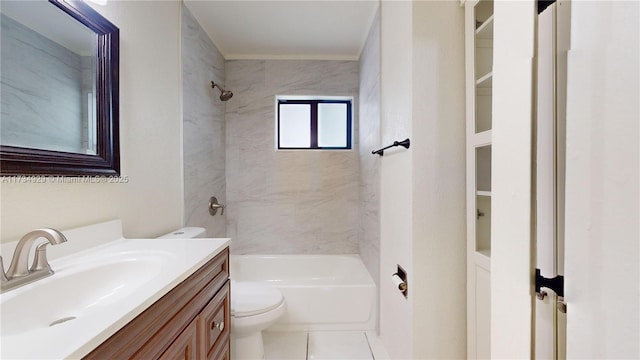 full bathroom featuring tiled shower / bath combo, vanity, and toilet