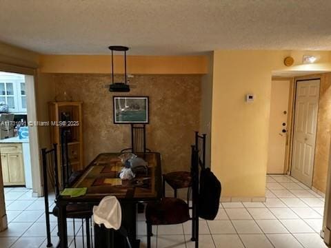 dining room with light tile patterned flooring