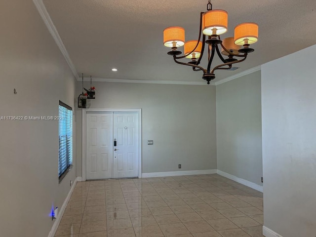 interior space featuring a textured ceiling, light tile patterned floors, a notable chandelier, baseboards, and ornamental molding