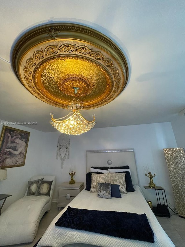 bedroom with a raised ceiling