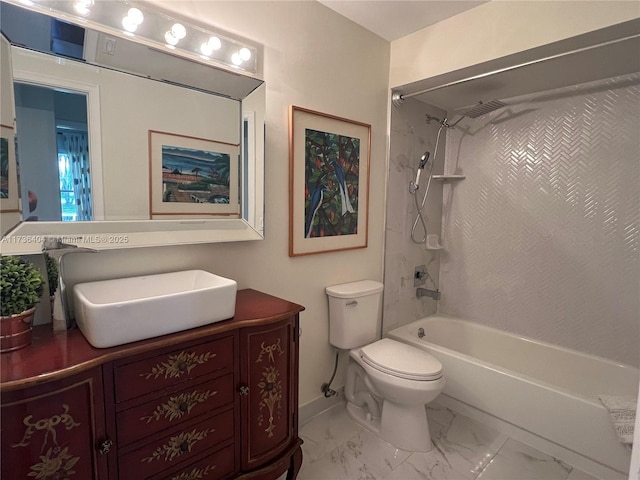 full bathroom featuring tiled shower / bath combo, vanity, and toilet