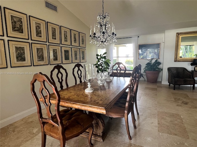 dining room with vaulted ceiling and a notable chandelier