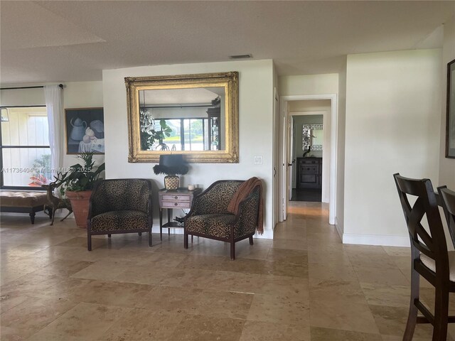 dining area featuring lofted ceiling and a notable chandelier