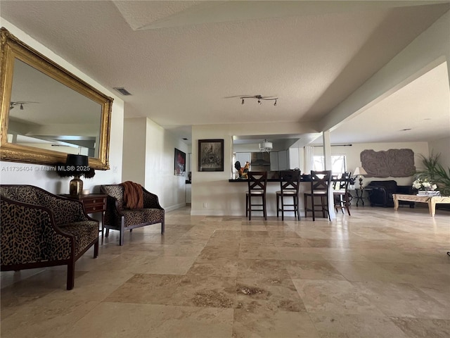 interior space with a textured ceiling