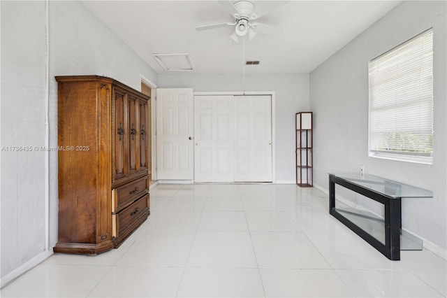 hallway featuring light tile patterned floors