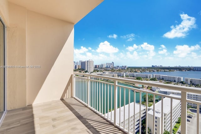 balcony featuring a water view