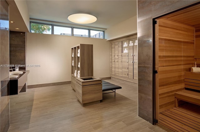 interior space with wood-type flooring and a healthy amount of sunlight