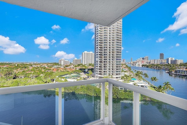 balcony featuring a water view