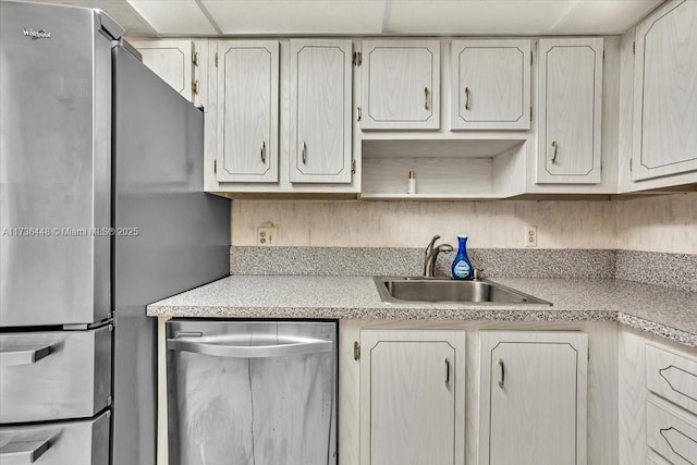 kitchen with appliances with stainless steel finishes and sink