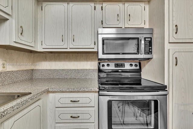 kitchen with appliances with stainless steel finishes