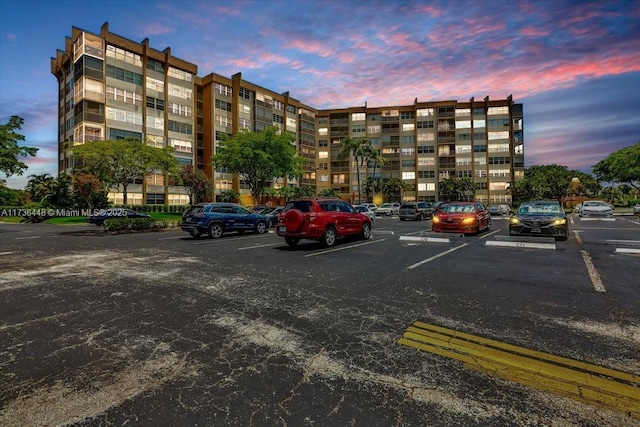 view of outdoor building at dusk